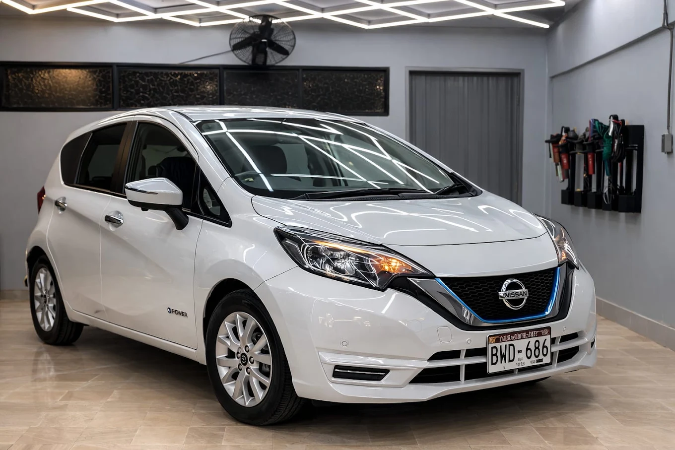 White Nissan after premium car detailing at Car Cosmetics Karachi