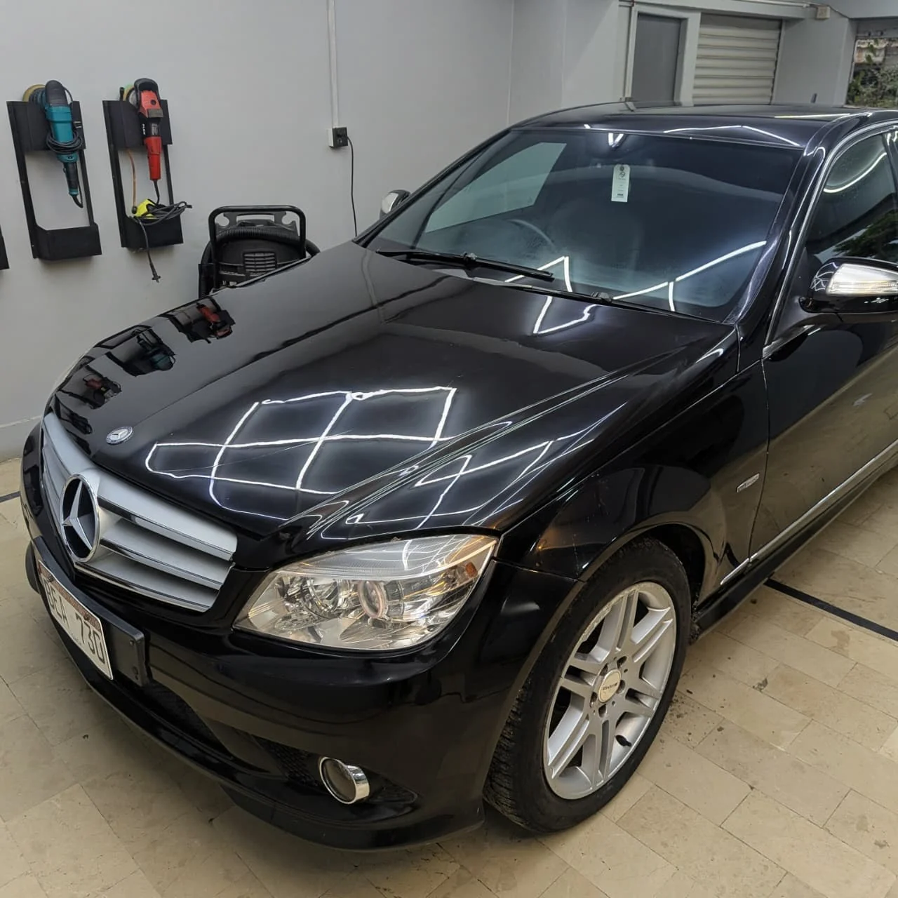 Black Mercedes paint correction and detailing at Car Cosmetics Karachi